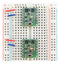 Mini Pushbutton Power Switches in a breadboard (SV version on top and LV version on bottom).